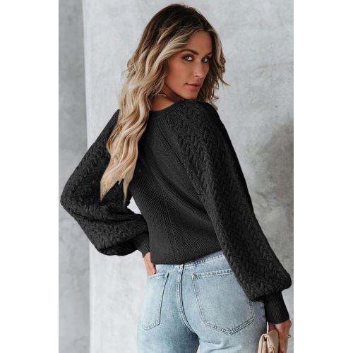 Черный кардиган с фигурным вырезом и объемным рукавом