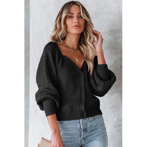 Черный кардиган с фигурным вырезом и объемным рукавом
