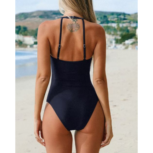 Морской слитный купальник с сетчатыми вставками для современного и элегантного пляжного стиля.