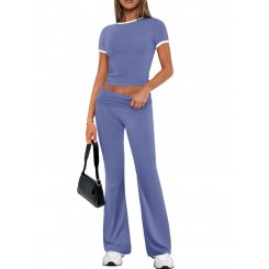 Женский костюм из двух предметов: кроп-топ и клеш-леггинсы с контрастной отделкой